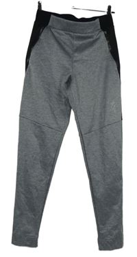 Dámské šedo-černé sportovní tepláky s logem GymKing 