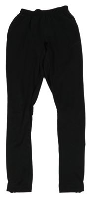 Černé funkční tepláky s logem Nike