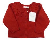 Nové - červený propínací svetr se vzorem a bambulkami Sfera