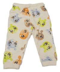 Krémové tepláky s příšerkami So Cute