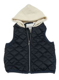 Tmavomdoro-smetanová šusťáková prošívaná zateplená vesta s teplákovou kapucí Orchestra 