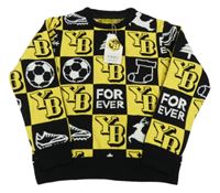 Nové - Černo-žlutý kostkovaný svetr s míči a písmenky 