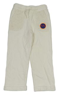 Bílé tepláky s nášivkou Primark