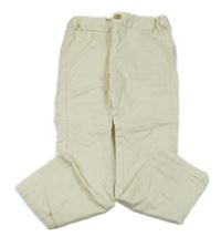 Smetanové skinny kalhoty s puntíky KIABI 