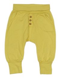 Žluté tepláky s knoflíky 