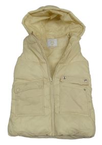 Světlebéžová šusťáková zateplená dlouhá vesta s kapucí Matalan