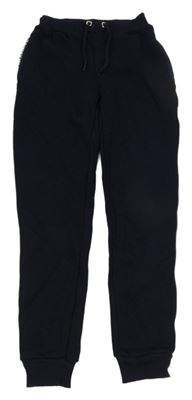 Tmavomodré silnější tepláky s logem Tommy Hilfiger