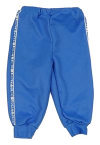 Modré tepláky s pruhem s nápisy - LOONEY TUNES SHEIN