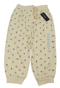 Smetanové tepláky s kvítky Dunnes Stores