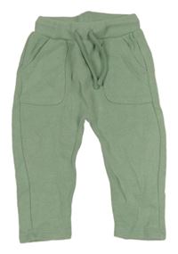 Zelené úpletové tepláky s kapsami 