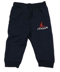 Tmavomodré tepláky s logem Jordan