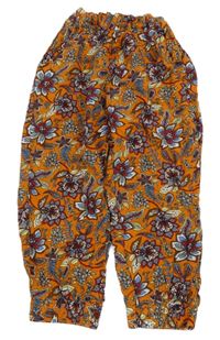 Oranžovo-barevné květované lehké kalhoty 
