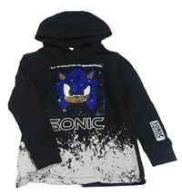 Černo-bílé melírované mikinotriko se Sonicem z překlápěcích flitrů a skvrnkami a kapucí Next