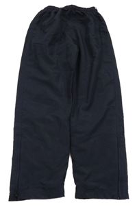 Tmavomodré šusťákové podšité kalhoty