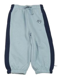 Modro-tmavomodré teplé tepláky se skateboardem/smajlíkem St. Bernard