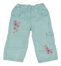 Světlemodré plátěné kalhoty s květy
