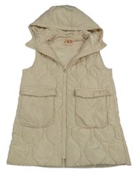 Béžová šusťáková prošívaná zateplená dlouhá vesta s kapucí Zara
