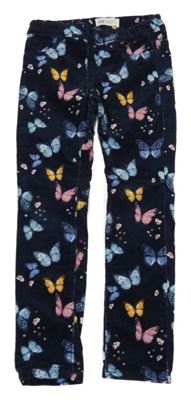Tmavomodré elastické manšestráky s motýlky H&M
