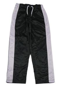 Černé tepláky s lila pruhem 