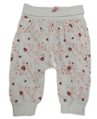 Bílé tepláky s beruškami Topomini