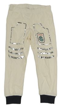 Smetanovo-tmavomodré tepláky s potiskem 