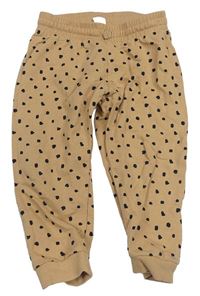 Světlehnědo-černé puntíkaté tepláky H&M