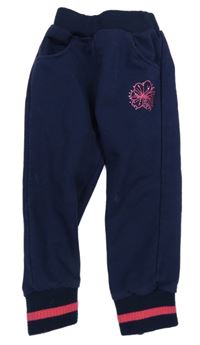 Tmavomodré tepláky s výšivkou a kamínky