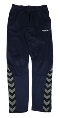 Tmavomodré sportovní tepláky s logem Hummel