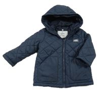 Tmavomodrá šusťáková prošívaná zateplená bunda s kapucí Topolino