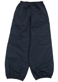 Tmavomodré šusťákové nepromokavé kalhoty TCM