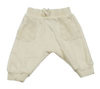 Smetanové tepláky George 