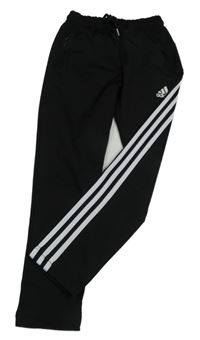 Černé sportovní tepláky s pruhy a logem Adidas