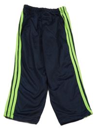 Tmavomodré sportovní tepláky se zelenými pruhy 