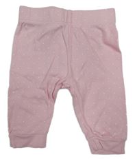 Světlerůžové puntíkaté tepláky s květem