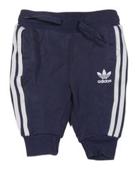 Tmavomodré tepláky s logem Adidas