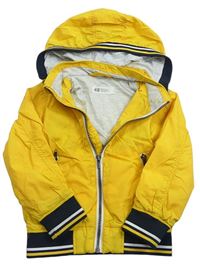 Hořčicová šusťáková jarní bunda s kapucí H&M