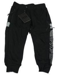 Nové - Černé tepláky s nápisy 