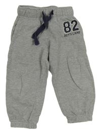 Šedé tepláky s číslem Lupilu