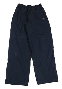 Tmavomodré šusťákové podšité kalhoty Domyos