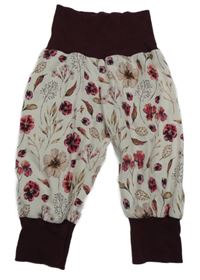 Smetanovo-mahagonové tepláky s kytičkami 