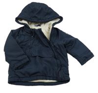 Tmavomodrá šusťáková zateplená bunda s nášivkou a kapucí so cute