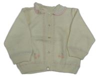 Smetanový propínací svetr s kytičkami