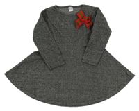 Černo-bílé vzorované úpletové šaty s mašlí 