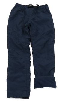 Tmavomodré šusťákové podšité kalhoty C&A