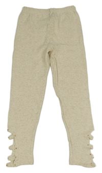 Smetanovo-šedobéžové melírované teplákové crop legíny s pecičkami a průstřihy