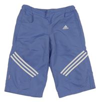 Fialovomodré šusťákové crop kalhoty s pruhy Adidas