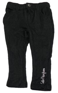 Černé tregíny riflového vzhledu s logem Calvin Klein