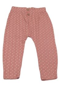 Růžové žebrované perforované turecké tepláky s kytičkami Topomini