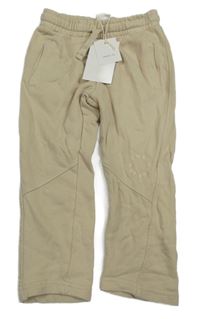 Nové - béžové tepláky s nápisy ZARA