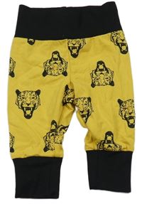 Nové - Okrovo-černé lehké tepláky s tygry